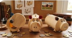 Bild von Zirbenholz Sparschwein